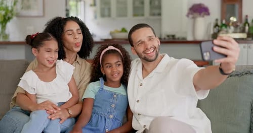 Happy Family Poses for Selfie at Home
