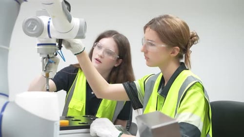 Engineering students practice robotics at a university lab during a hands-on workshop
