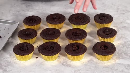 Filling in Chocolate Cupcakes with Chocolate Ganache