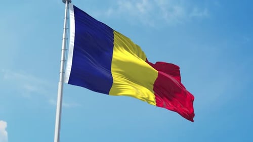 Realistic Waving Romania Flag Against Blue Sky