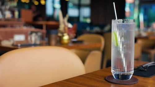 A Charming Restaurant and Bar Scene Showcasing a Refreshing Drink Captured in Stunning Resolution