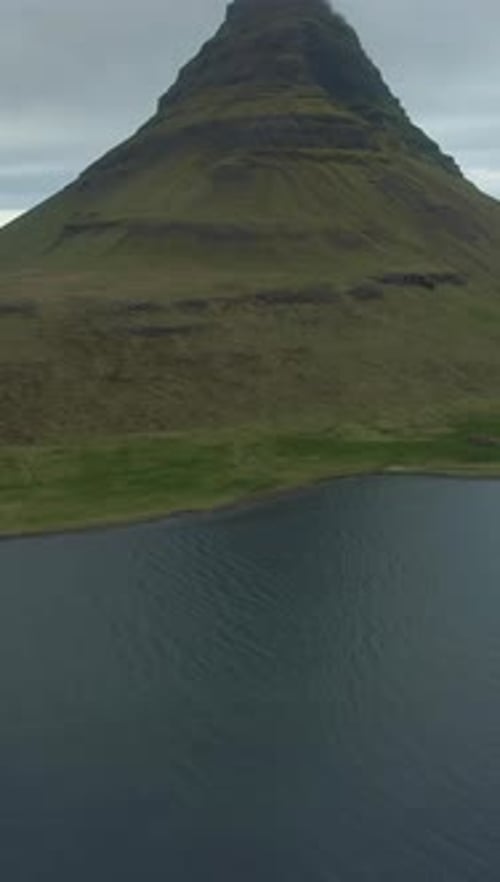 Kirkjufell Mountain in Summer Day Iceland Aerial View Vertical Video