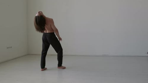 Shirtless Man Dancing Contemporary Style on Rehearsal in Studio
