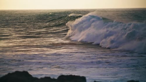 Powerful Ocean Wave Breaking Surface On Gloomy Day. Stormy Surf Rolling Rocky Coastline. Foamy Wh...