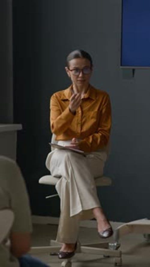 Vertical of Teacher Leading Motivational English Lesson