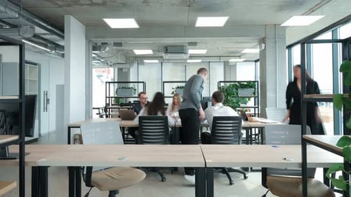 Timelapse of group of people that are working in the modern office together