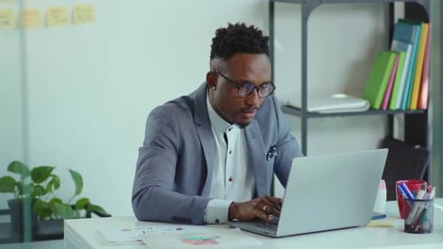 Sick African American Young Man Use Laptop at Office Sitting on Desk Cough Project Businessman