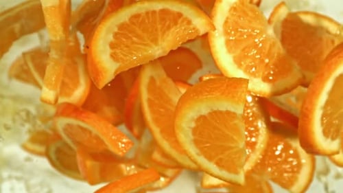 Orange Slices Fly Up and Fall Down Filmed on a Highspeed Camera at 1000 Fps