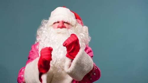 Santa Claus Boxing on Blue Background