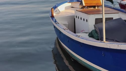 Wooden Boat On The Calm Sea Water 1