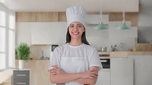 Portrait of Happy Indian female professional chef