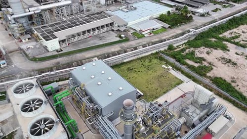 Aerial View of Industrial Power Plant on Cloudy Day