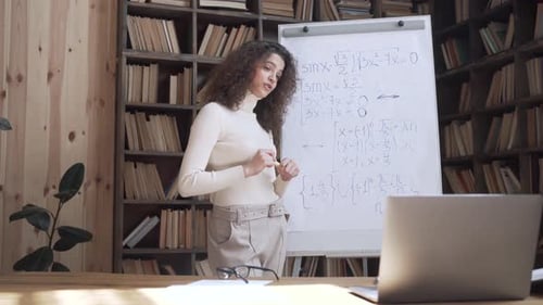 Latin Professional Tutor Teaching Math Class Explaining Remote Lesson. Hispanic Female College