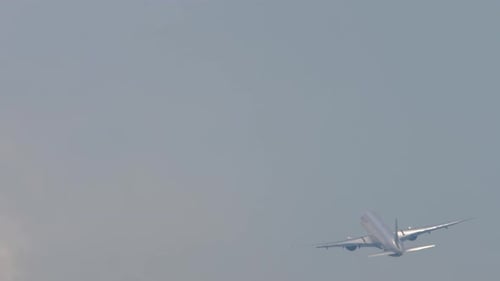 Commercial Plane Takes Off in Gray Skies