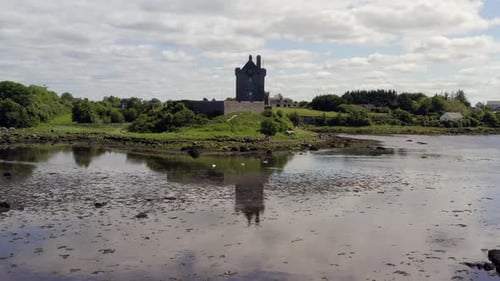 Beautiful dolly shot of Dunguaire Castle