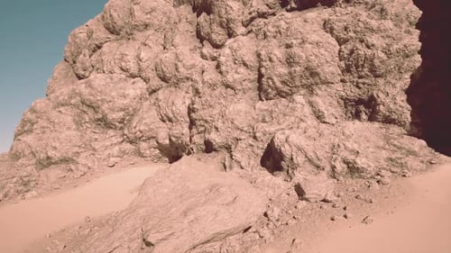 Massive Rock Formation in Desert