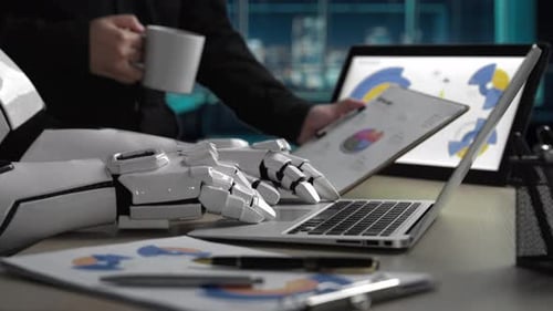 Robot Typing on Laptop in Office at Night