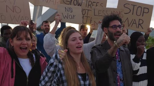Crowd Protesting Against War in Urban Setting