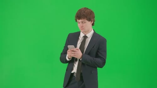Portrait of Male Model in Suit on Chroma Key Green Screen Handsome Young Businessman in Trendy Suit