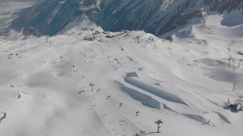 Drone Over Ski Slope With Cable Car On Mountain