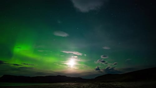 Nothern lights in Arctic. Timelapse of the sky with Aurora Borealis shining green