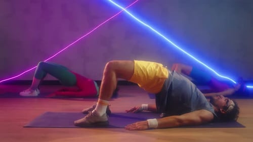 People Doing Glute Bridge Exercise in Room