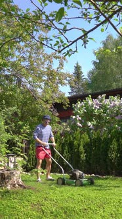 Man Mowing the Lawn