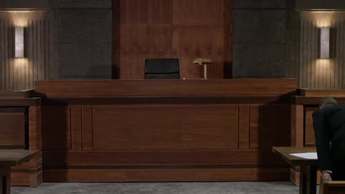 Court lawyers in trial court in front of a judge