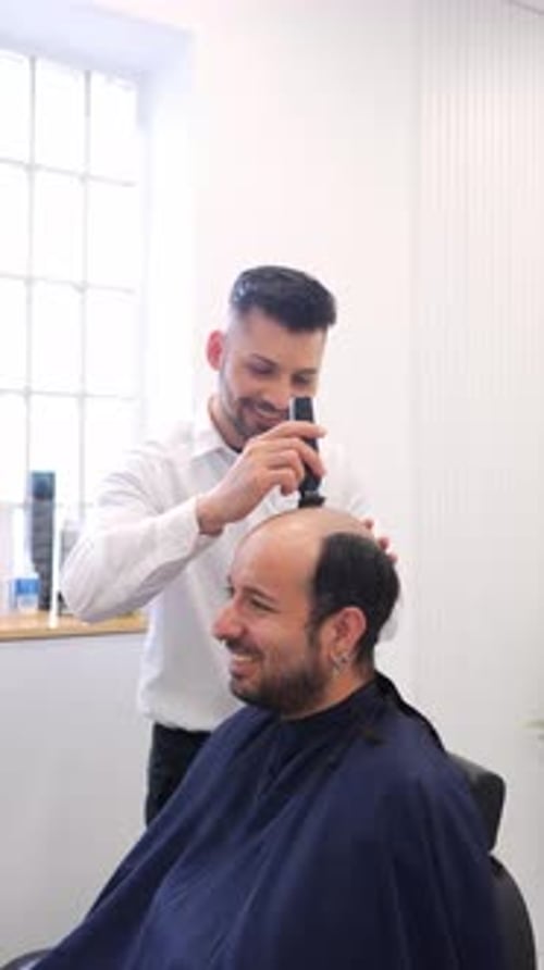 Barber Giving Haircut in Bright Barber Shop