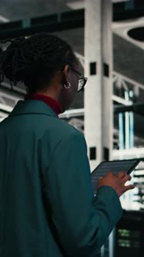 Vertical Video Writing Code Tablet Application and Programmer in Data Center