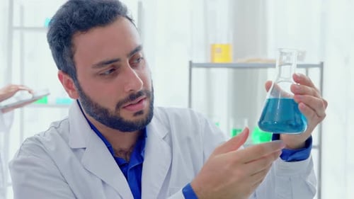 Scientist Micro Pipette for Analysis in a Medical Research Laboratory Advanced Medical and Biotechno