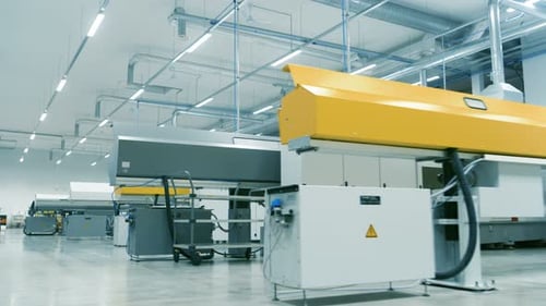 Moving Walkthrough Shot of the High-Tech Modern Electronics Manufacturing Factory Full of Computeri
