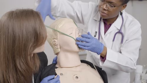 CPR. Oxygen mask application in a medical clinic