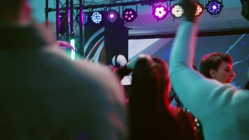 Young Man with Headset on Stage