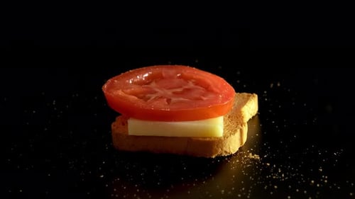 Building a Sandwich with Bread, Cheese and Tomato