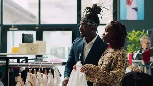 Young Adults Shopping for Clothes in Boutique