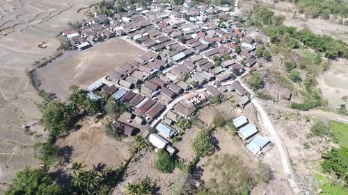 Aerial village and mountain views
