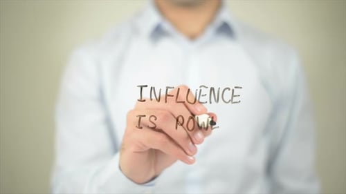 Man Writes Influence is Power Message