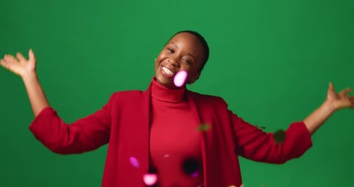Face, black woman and confetti for success, studio or applause to celebrate win, space or good news
