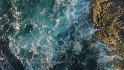 Waves Breaking Against The Rocky Coastline Of Laxe In Spain. - aerial