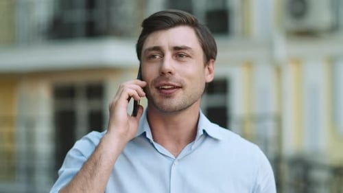 Close Up Confident Businessman Talking Phone at Modern Street. Portrait of Happy