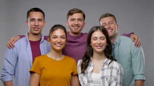 Happy Group of Friends Smiling in Studio