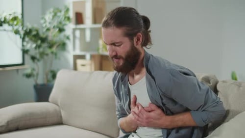 Man Has Got the Symptoms of Heart Attack Breathing Problems Chest Pain