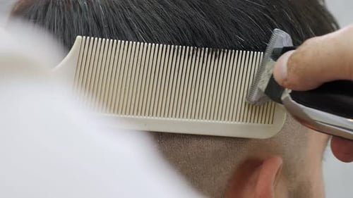 Haircut using Clippers and Comb Close Up