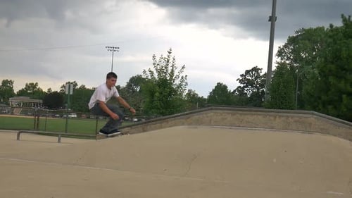 person gets some air on their skateboard at the skatepark