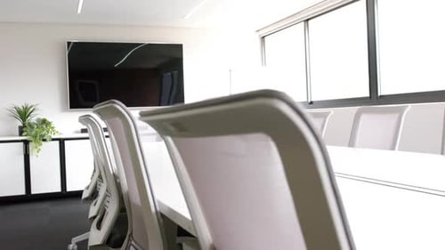 Empty Conference Room with Table and Chairs