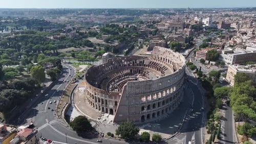 Aerial Establishing Shot of Colosseum and Rome Cityscape in Italy