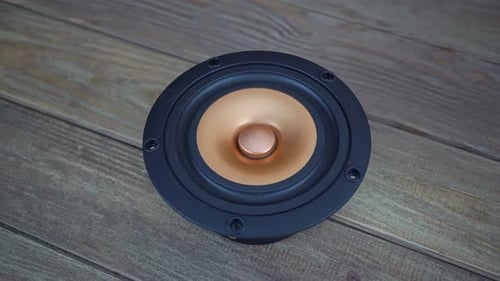 Close Up of a Black and Copper Speaker