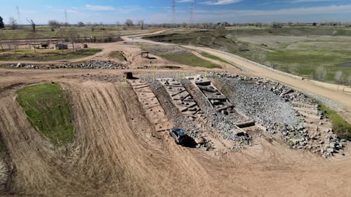 Four-wheel drive car is driving up a hill on a dirt road. Prairie City Off-Highway Motor Vehicle Rec