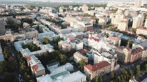 Ukraine, Kyiv, Drone Footage of a city view on a sunny day, buildings, parks and streets.